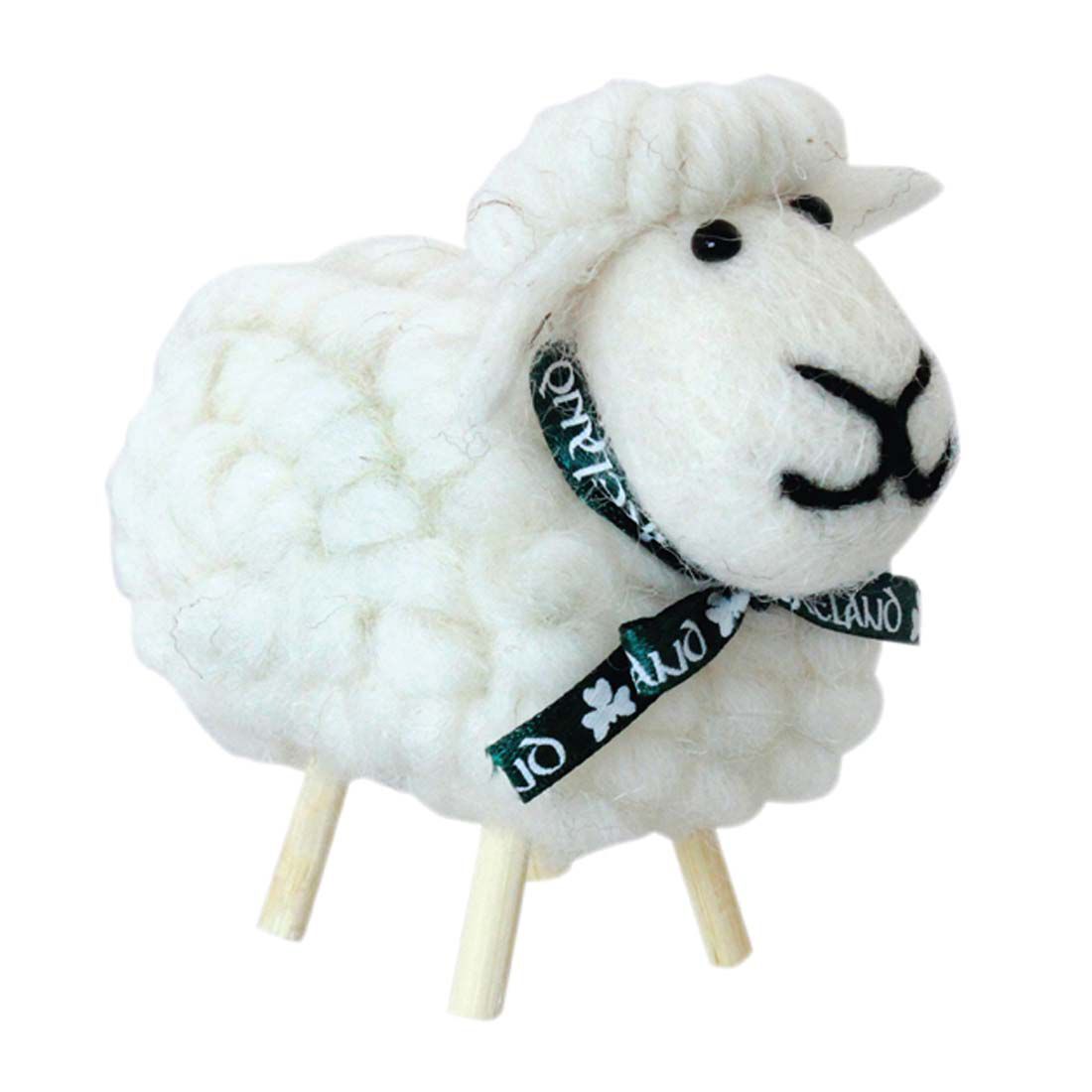 Irish white cotton wool sheep ornament on three wooden legs with a dark green ribbon.