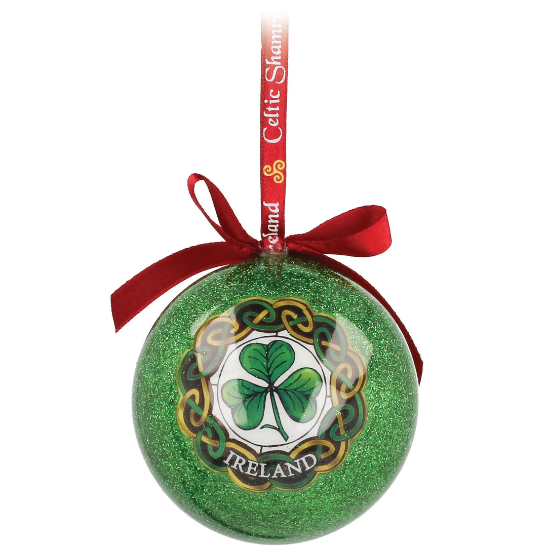 Green glittery ornament with shamrock and red ribbon bow