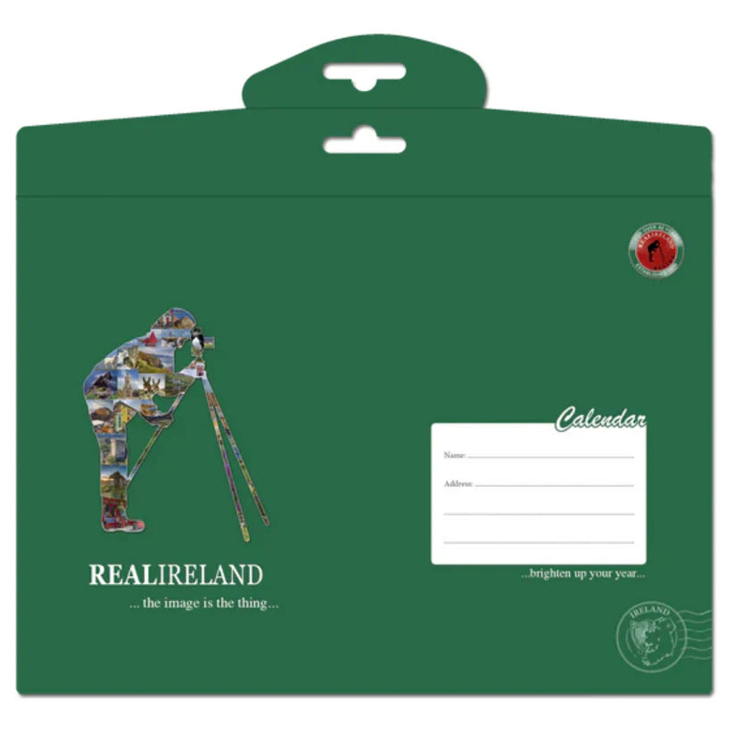 Green calendar cover with photographer silhouette made of landscape photos