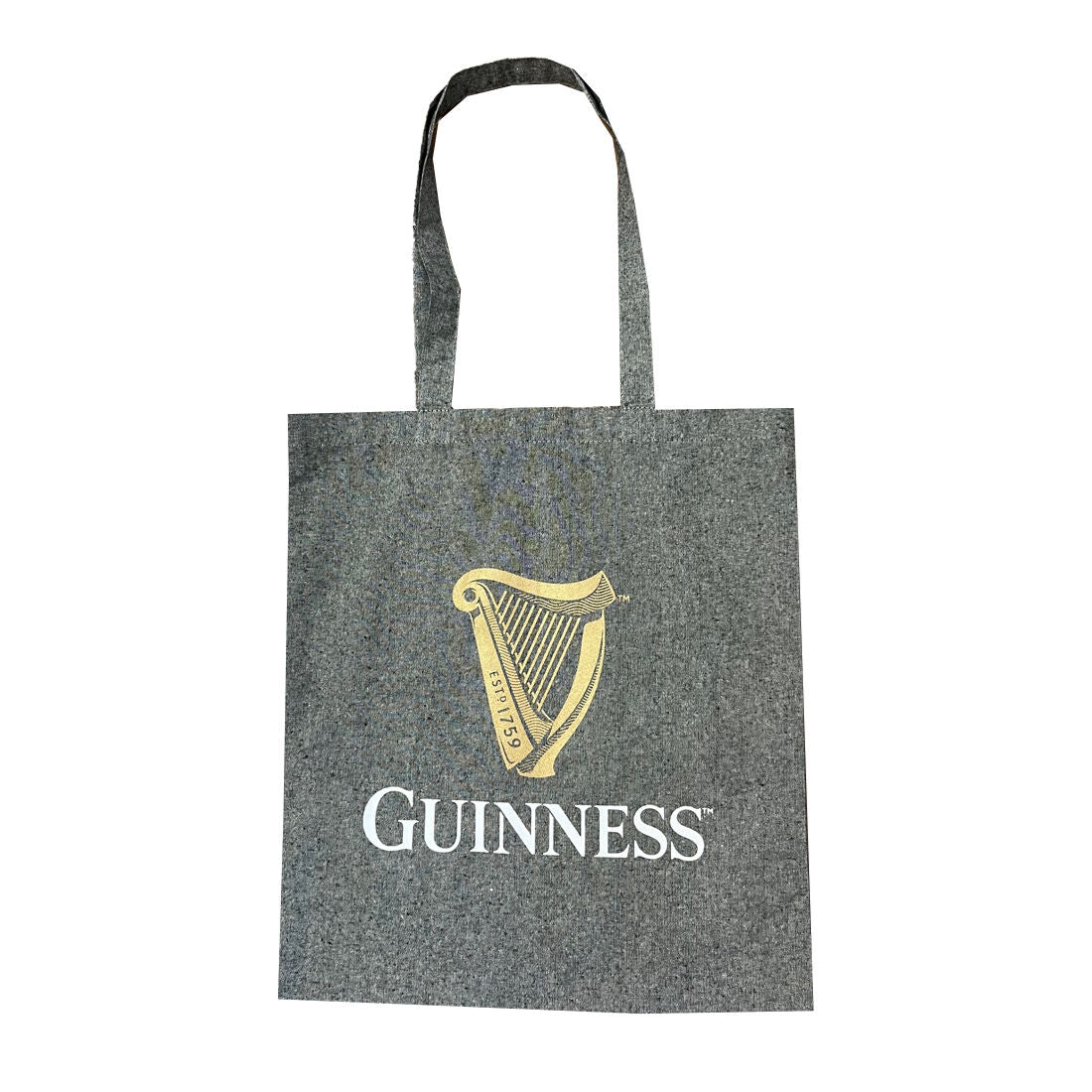 Guinness tote bag in dark fabric with a gold harp logo.