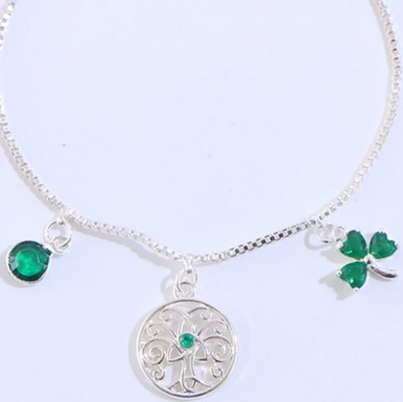 Silver chain bracelet with green gem and clover charms