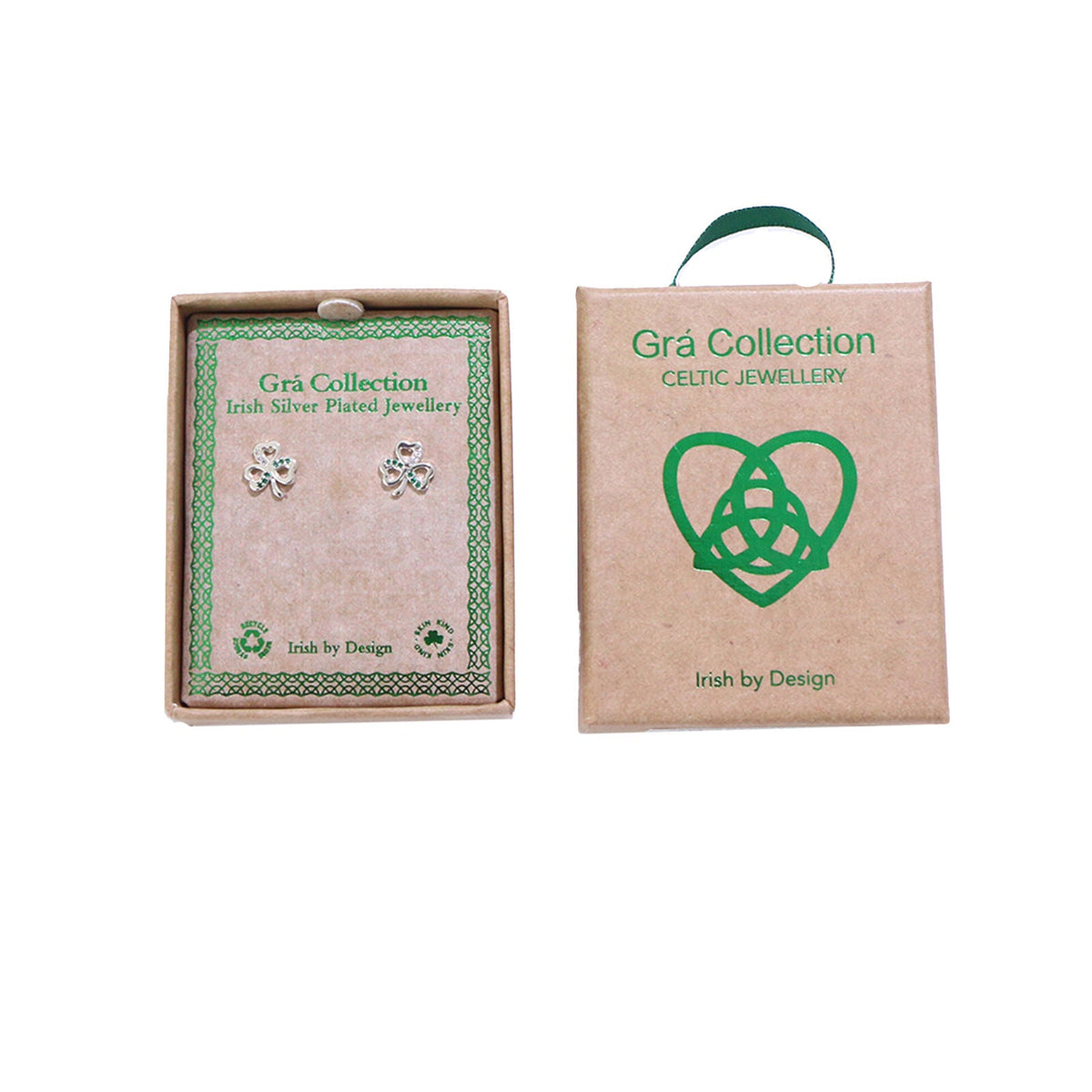 Pair of silver shamrock earrings in a brown box with green text
