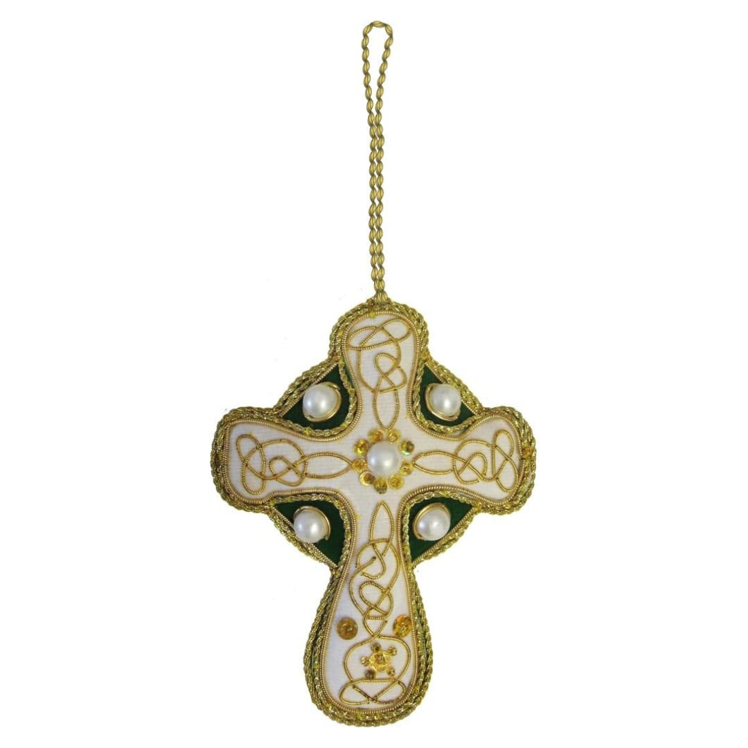 Cross shaped Christmas ornament with white fabric, gold Celtic knot embroidery, pearls, and a gold hanging cord