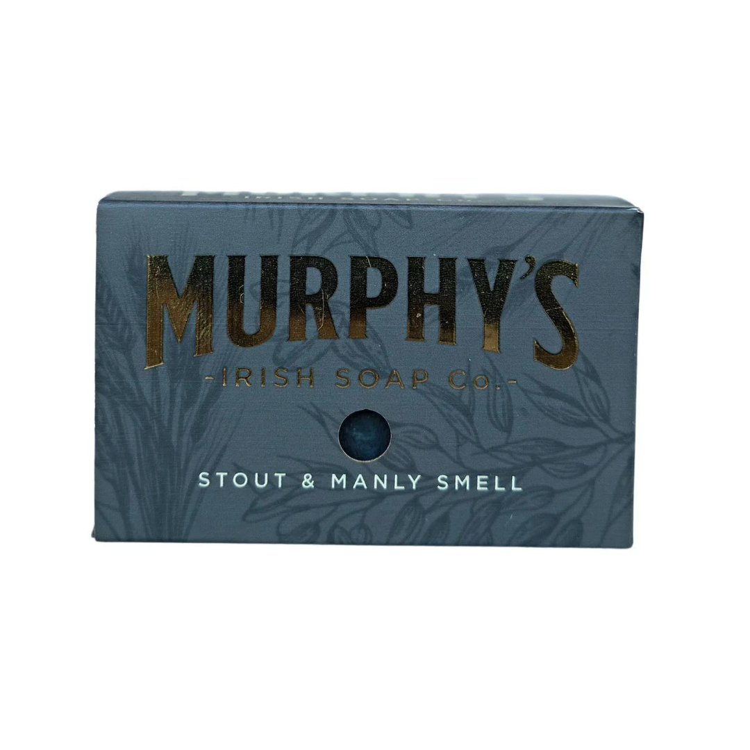 Dark blue soap box with gold lettering and botanical design