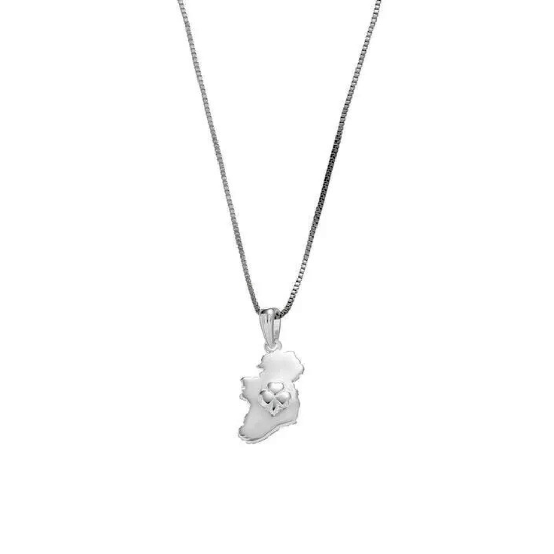 Silver pendant shaped like a country with a four-leaf clover detail