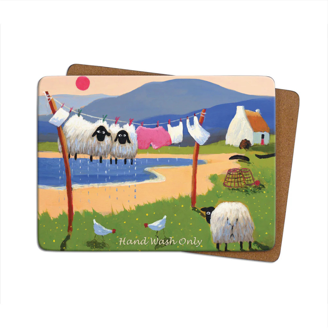 Two sheep hanging on a clothesline with laundry near a lake and cottage