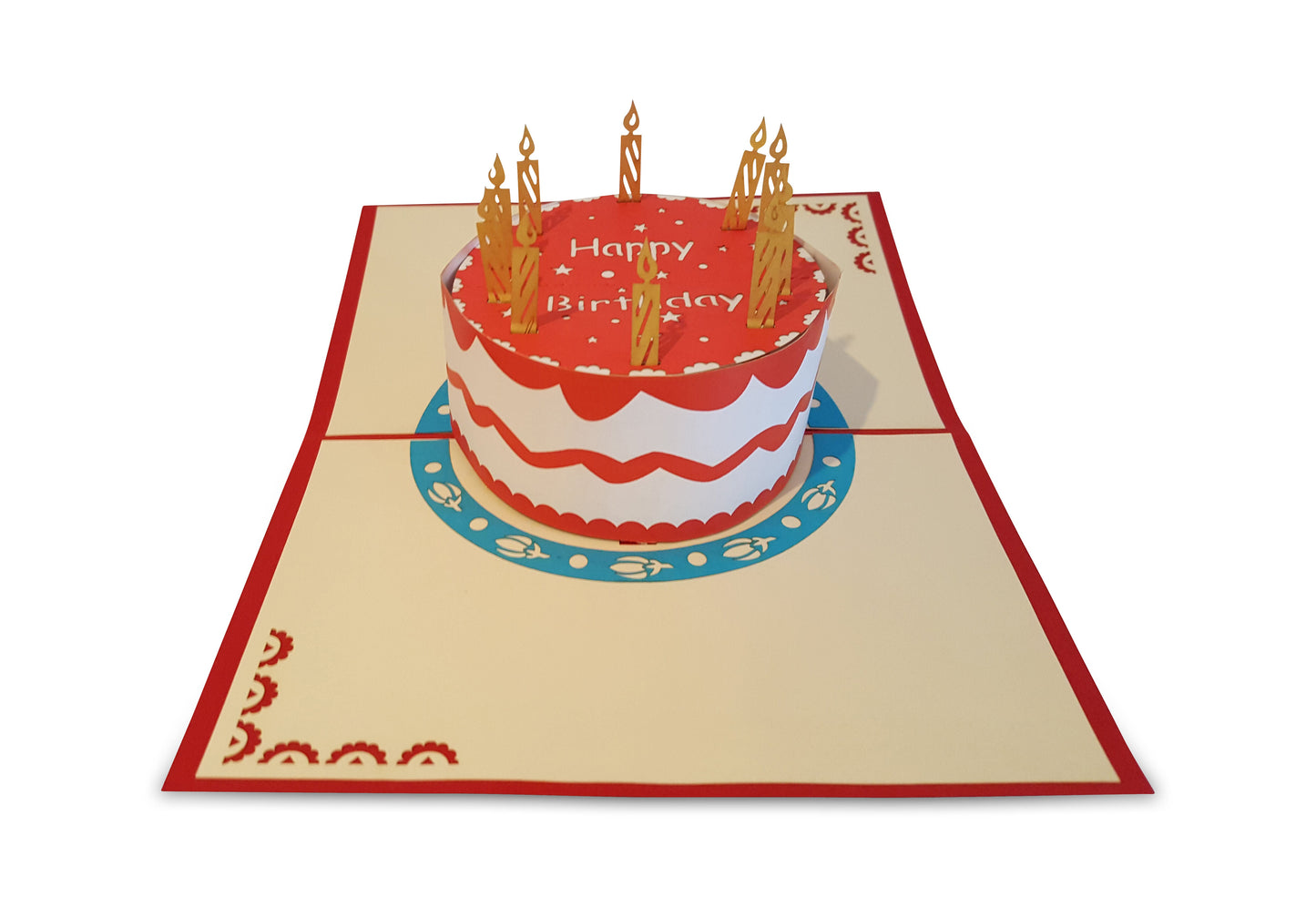 Red and white pop-up birthday cake card with lit candles and decorative frosting