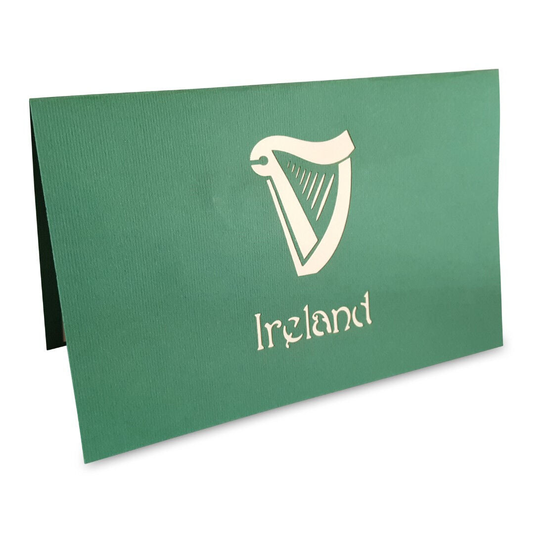 Green card with Ireland branding displaying a white harp symbol and the word Ireland on the cover