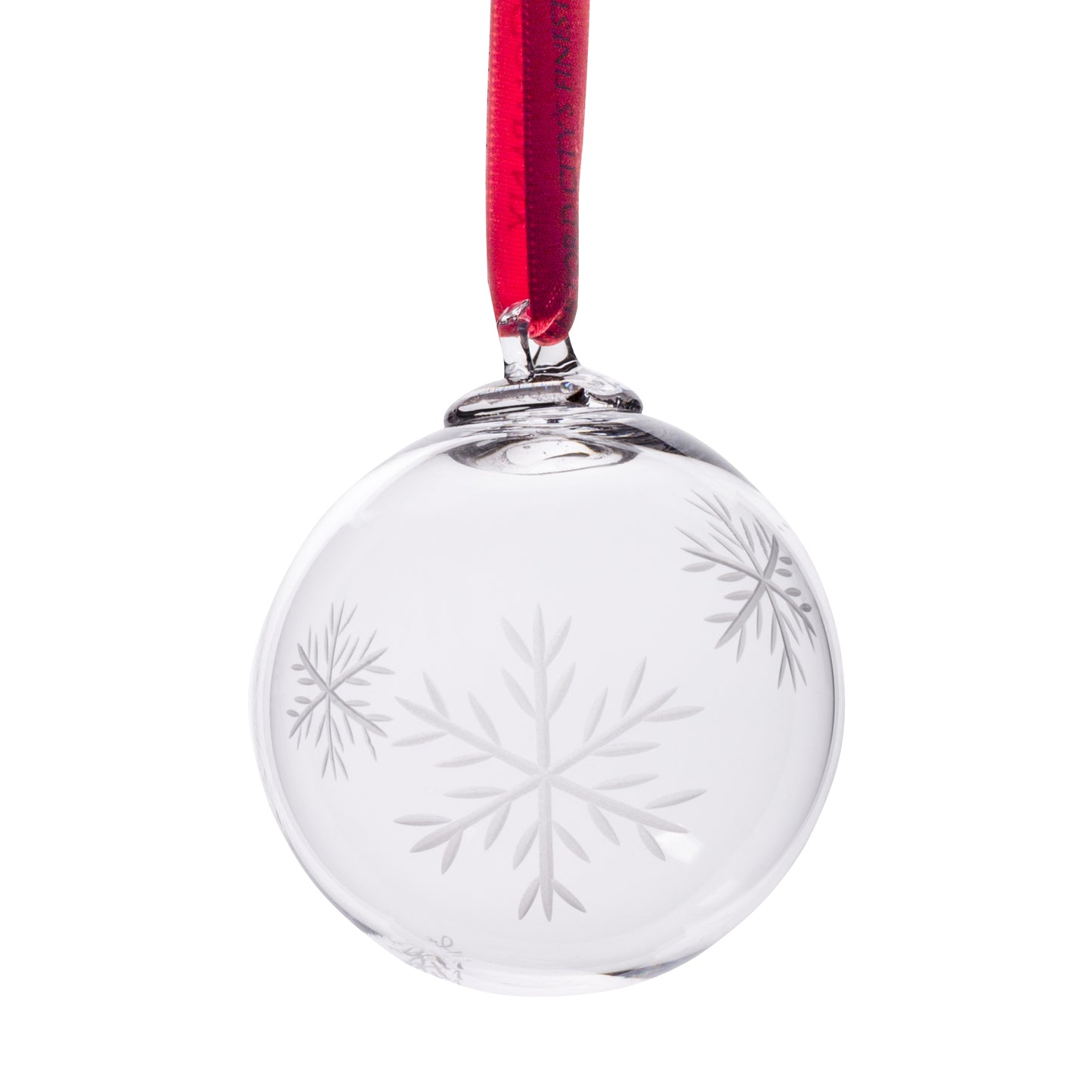 Clear glass round snowflake bauble with frosted snowflake engravings, suspended from a red ribbon.