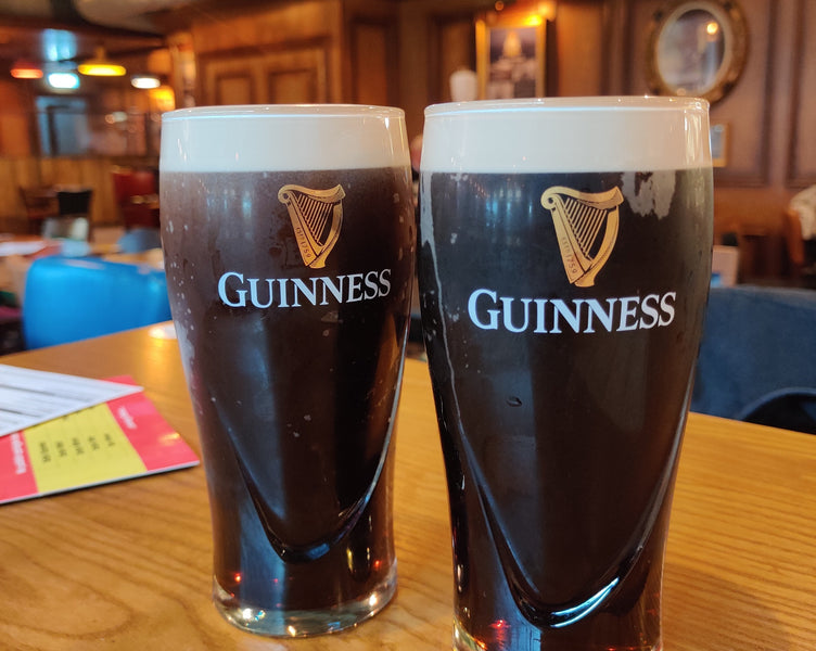 Two pints of Guinness settling