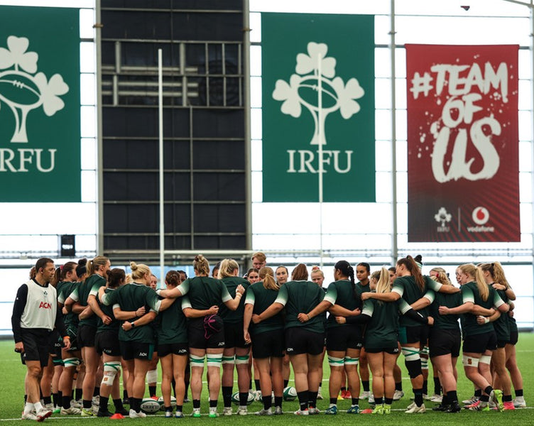 Women's rugby team on pitch