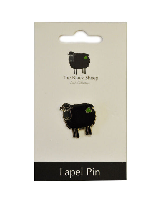 Black sheep lapel pin with green clover on white card backing