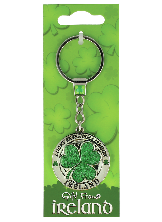 Round silver spinner keychain with glittery green shamrock and Ireland inscription