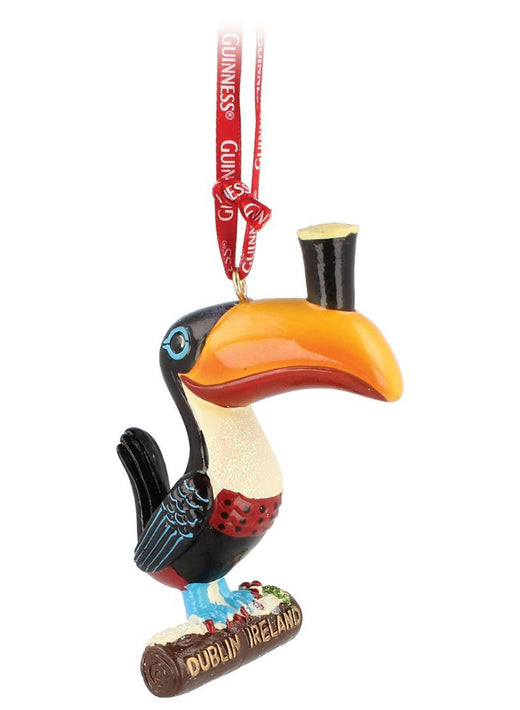 Guinness toucan resin tree ornament with a red Guinness ribbon and a Dublin Ireland base.