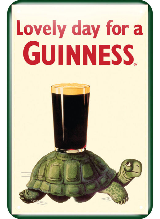 Turtle carrying a pint of dark beer with text about a lovely day