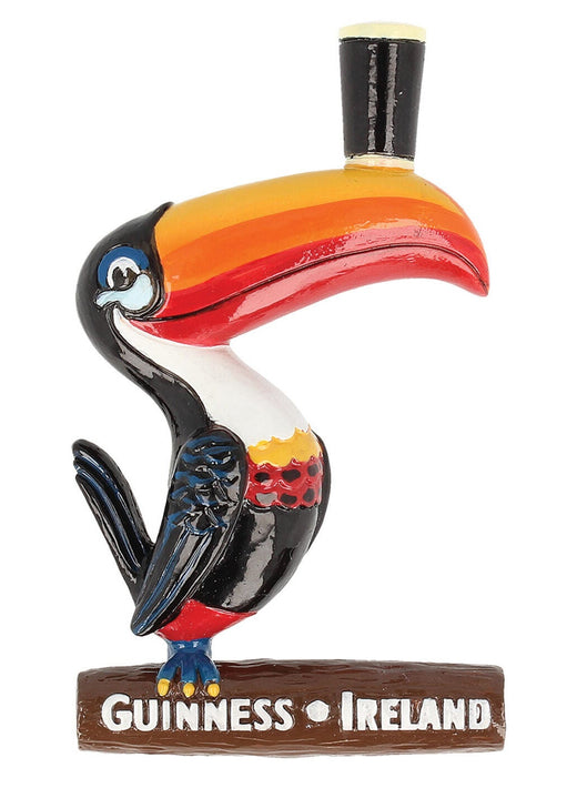 Colorful toucan figurine with a large beak standing on a base