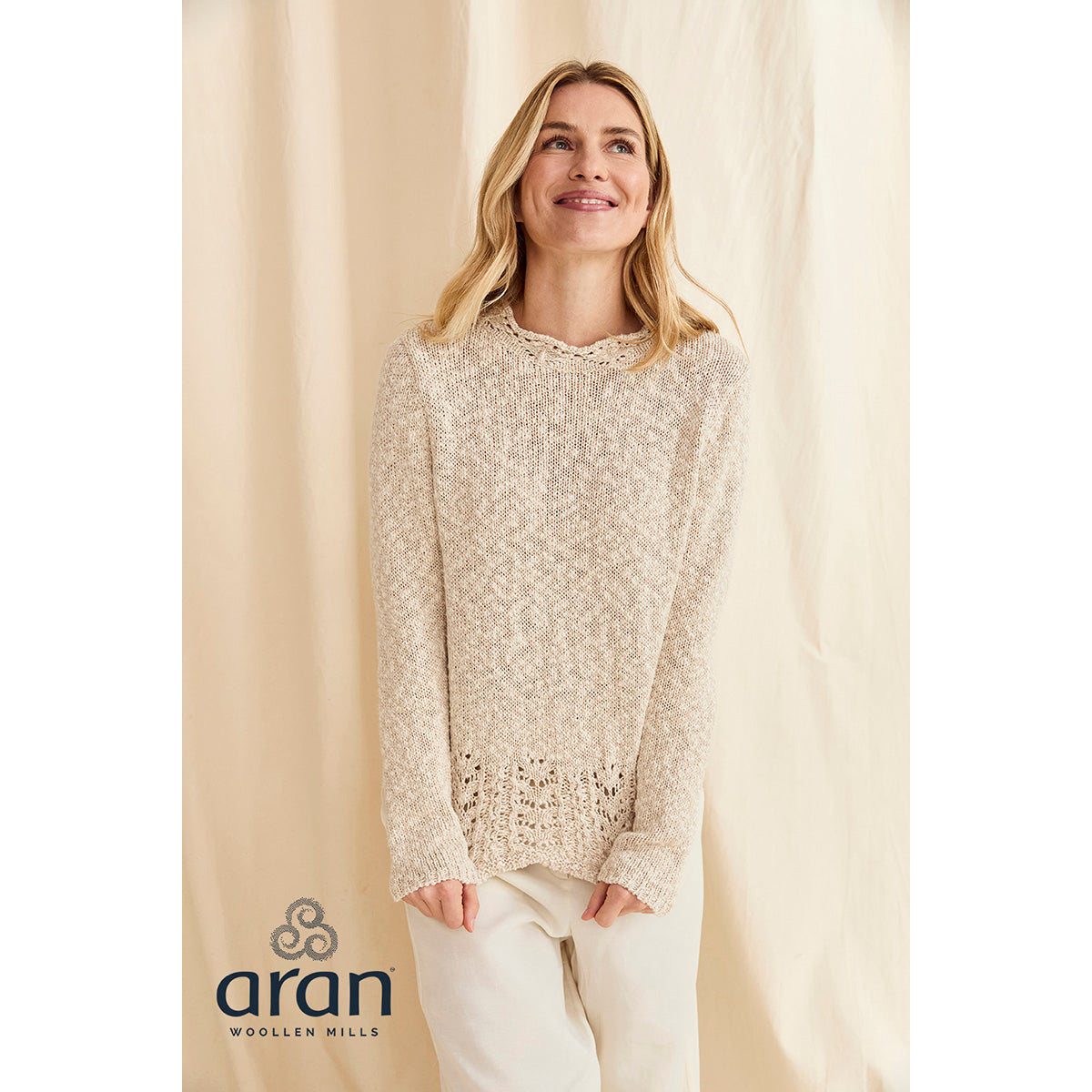 Cream knit sweater with lace trim at the hem and relaxed fit from the Arawn Cotton Linen collection.