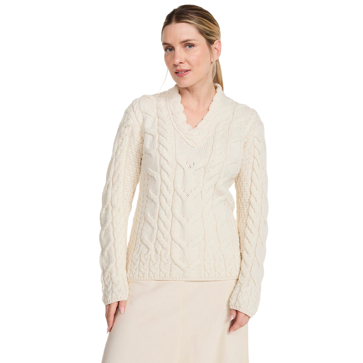 Cream Tralee V-Neck Super Soft Merino sweater on a model with cable knit texture