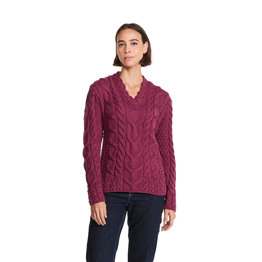 Magenta V-neck Merino sweater worn by a model