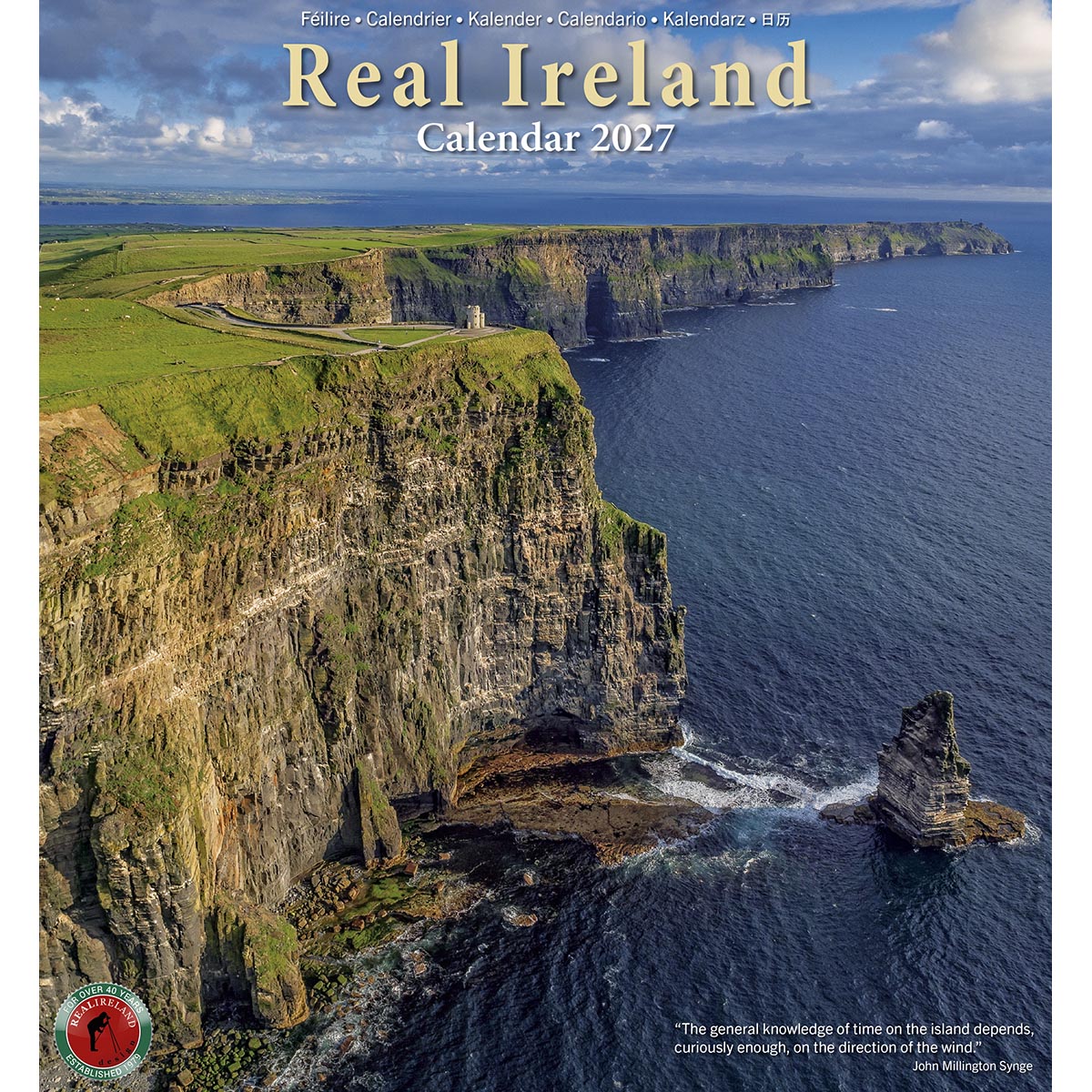 Real Ireland Calendar 2027 cover showing a dramatic cliff coastline with green fields and a swan on the water
