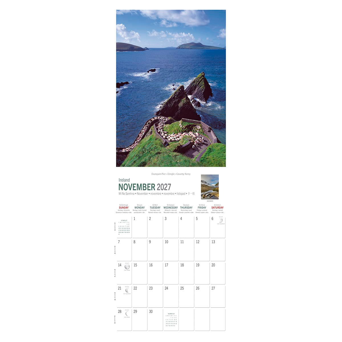 Dunquin Pier cliff walk along the Kerry coast with green slopes and blue Atlantic