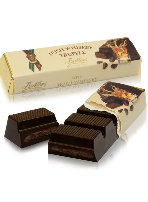 Irish whiskey truffle chocolate bar partially unwrapped with one piece separated