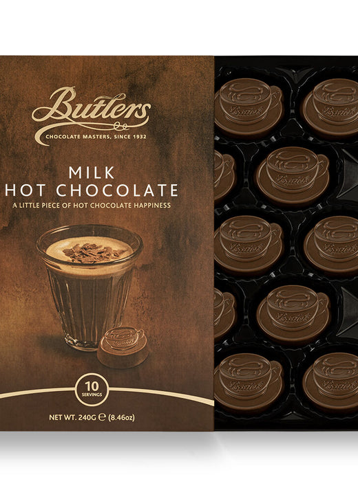 Box of milk hot chocolate discs with packaging showing a glass of hot chocolate