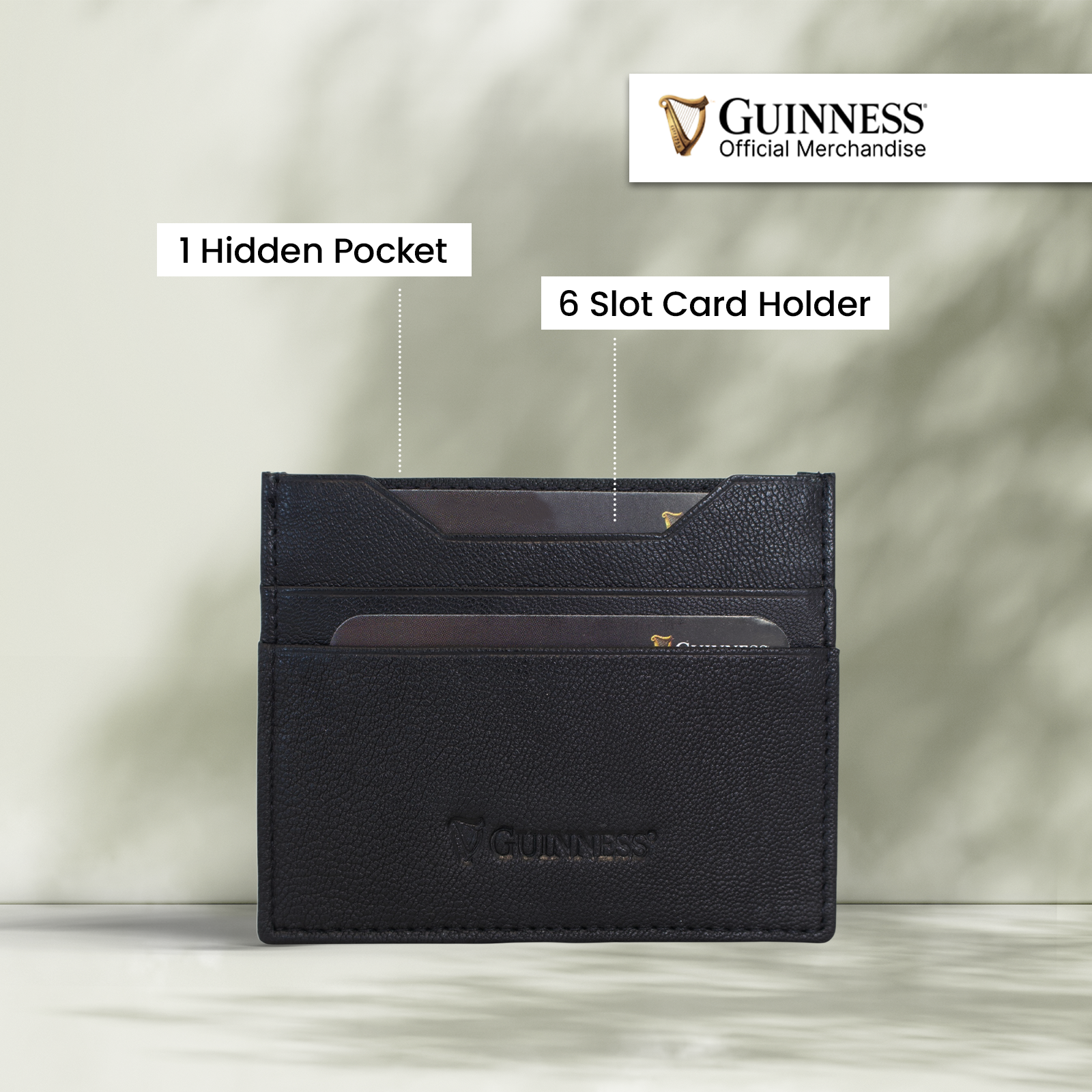 Guinness black card holder with six slots and a hidden pocket.