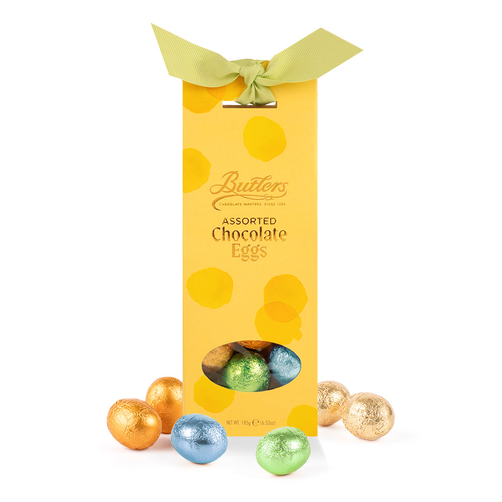 Yellow Butlers assorted chocolate eggs box with a green ribbon and a window revealing foil wrapped eggs