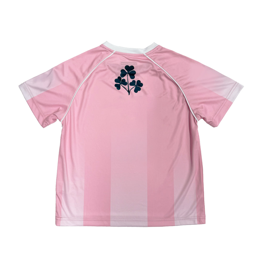 Back view of pink Ireland performance top with crest on the upper back and white piping along seams