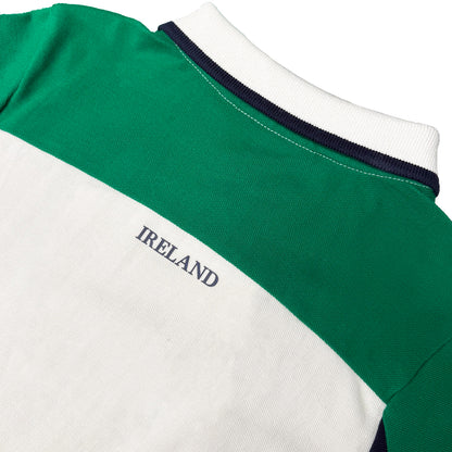 Back view of Lansdowne Ireland kids polo shirt showing green upper panel white section with Ireland text and navy trimmed collar