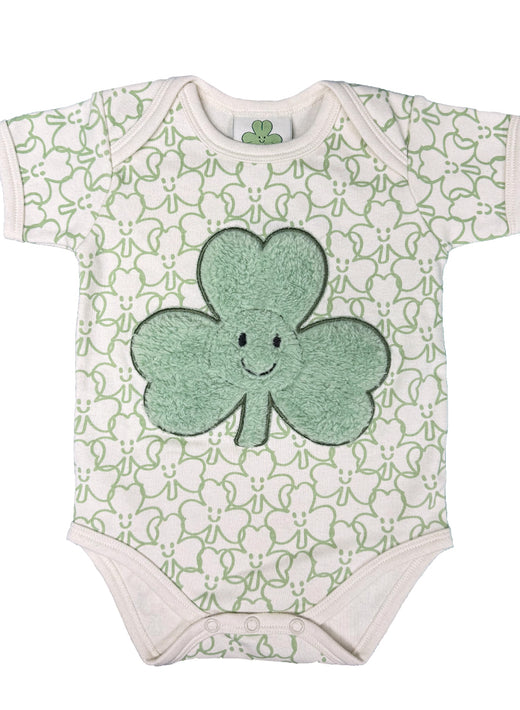Cream allover shamrock print baby vest with a large plush mint green shamrock on front