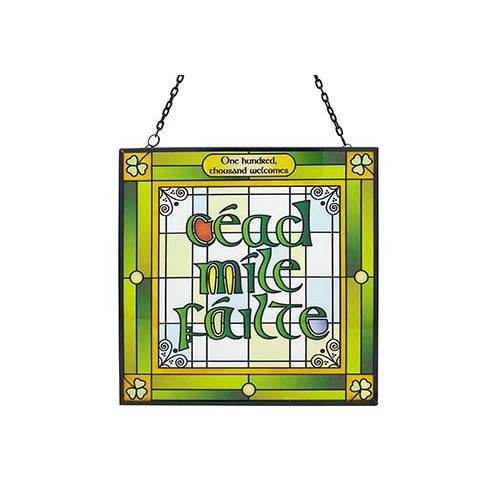 Stained glass hanging plaque with the phrase Céad Míle Fáilte in green letters, framed by yellow and green panels.