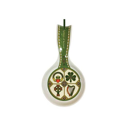 Ireland symbols spoon rest with a circular panel showing shamrock harp cross and heart on a white base with green trim