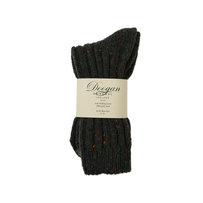 Flecked Green Acre Socks in dark knit with colorful flecks and a beige label