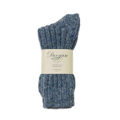 Flecked Opal Socks in blue heather with textured knit and label around the center