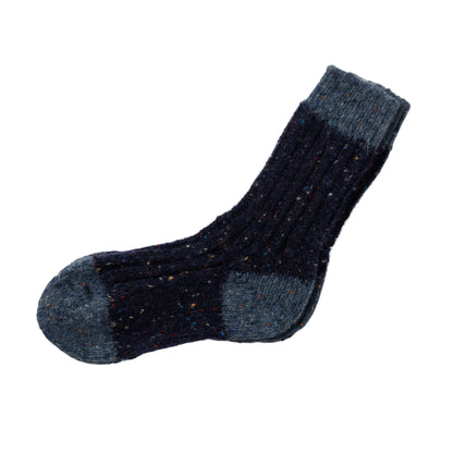 Flecked navy socks with multicolored specks and a blue toe