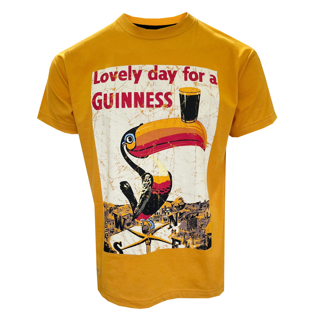 Golden yellow T-shirt with a retro Guinness toucan graphic and the text Lovely day for a Guinness
