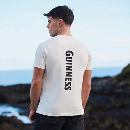 Back view of white Guinness Smiling Pint T-shirt with vertical GUINNESS text down the back