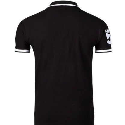 Back view of black Guinness polo shirt showing white 59 patch on the sleeve and striped cuffs.