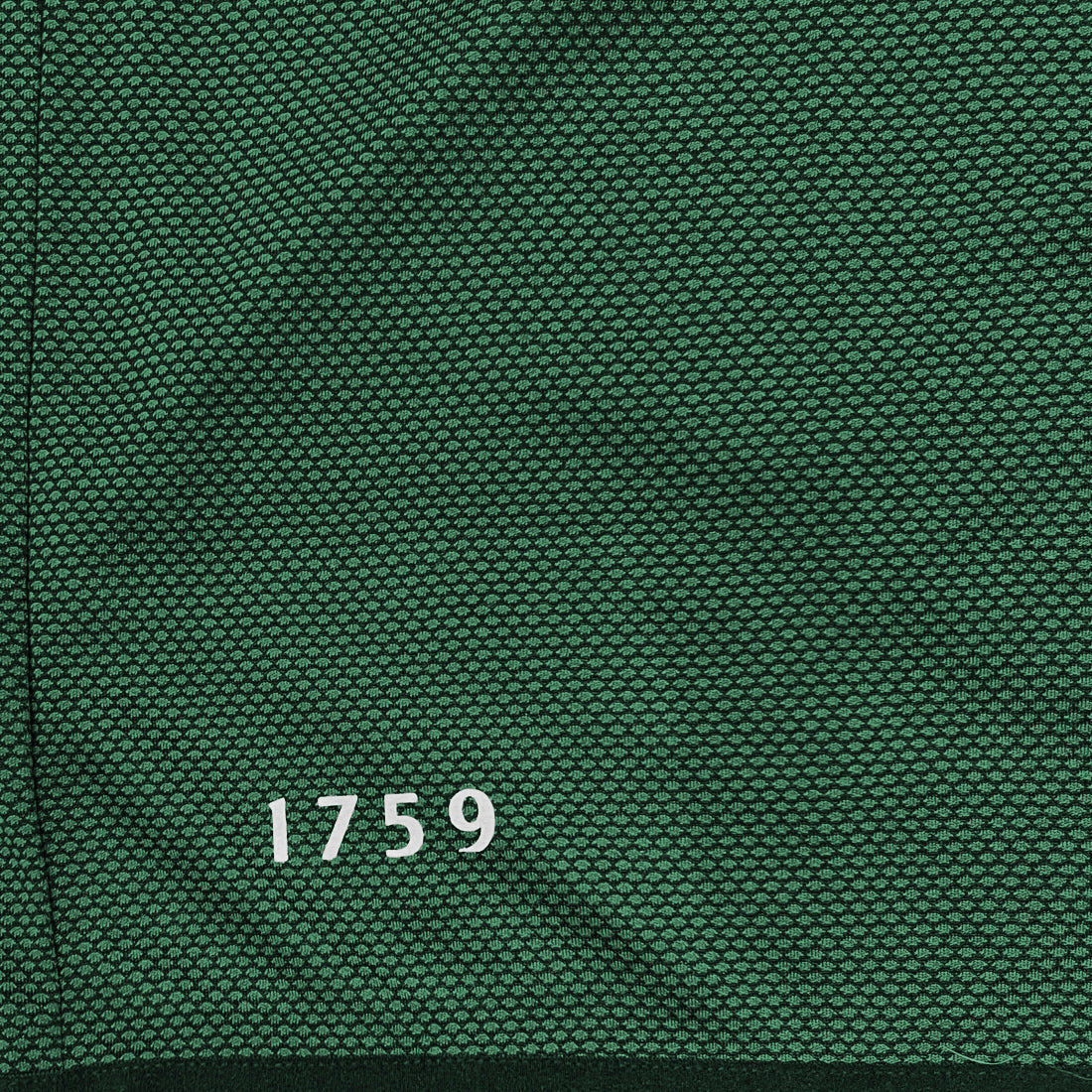 Green textured mesh fabric with white 1759 printed