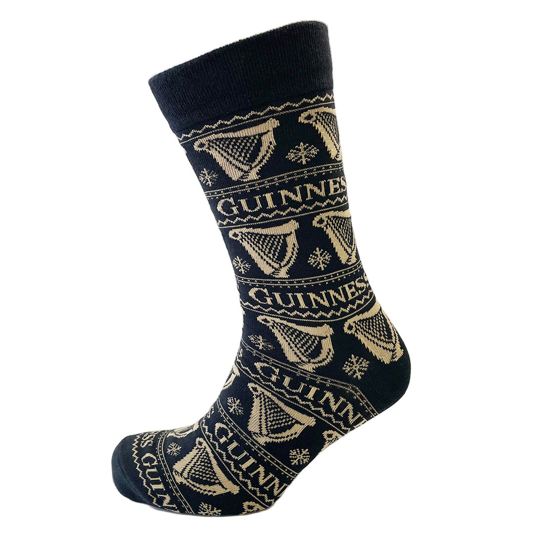 Close up of navy Guinness Harp socks with beige harp motifs wrapping around