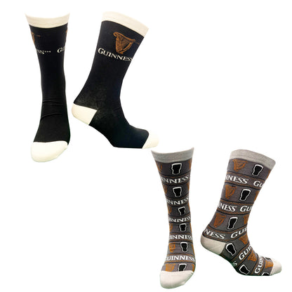 Guinness All Over Print Pint Socks set in black with beige cuffs and toes featuring harp and logo patterns.