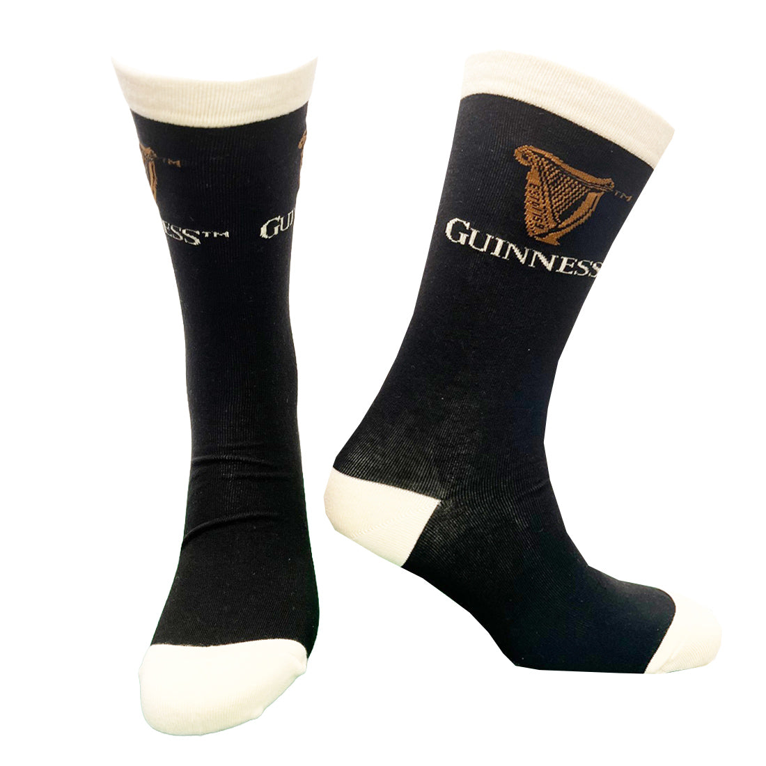 Guinness All Over Print Pint Socks collage showing black socks with white toe caps and harp logos and a gray patterned pair with repeated Guinness motifs.