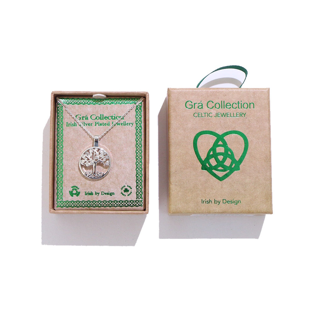 Silver Tree of Life pendant on a chain displayed in a Grá Collection gift box with a green border