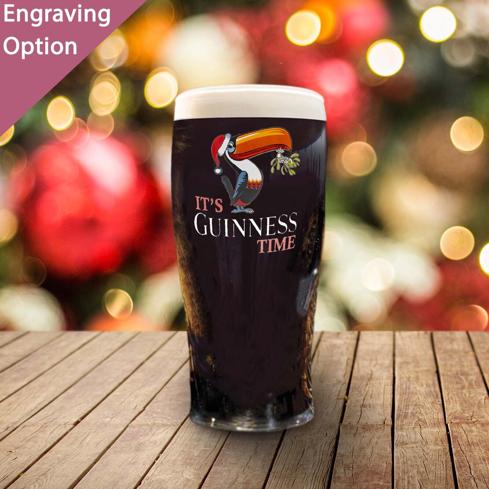 Guinness Toucan Christmas Pint Glass on a Festive background