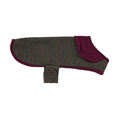 Side view of Heritage Tweed Small Green Checked Dog Coat showing purple trim along hem and a fabric strap