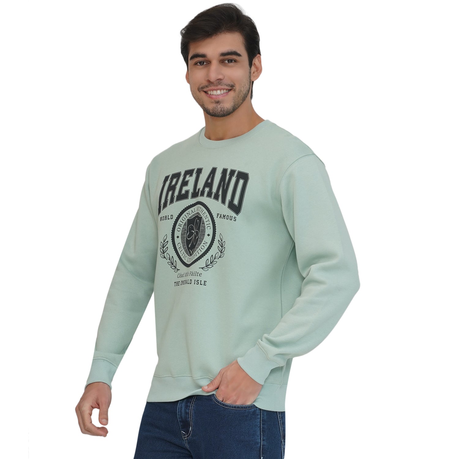 Male model wearing Ireland Badge Unisex Pistachio Sweatshirt facing forward.