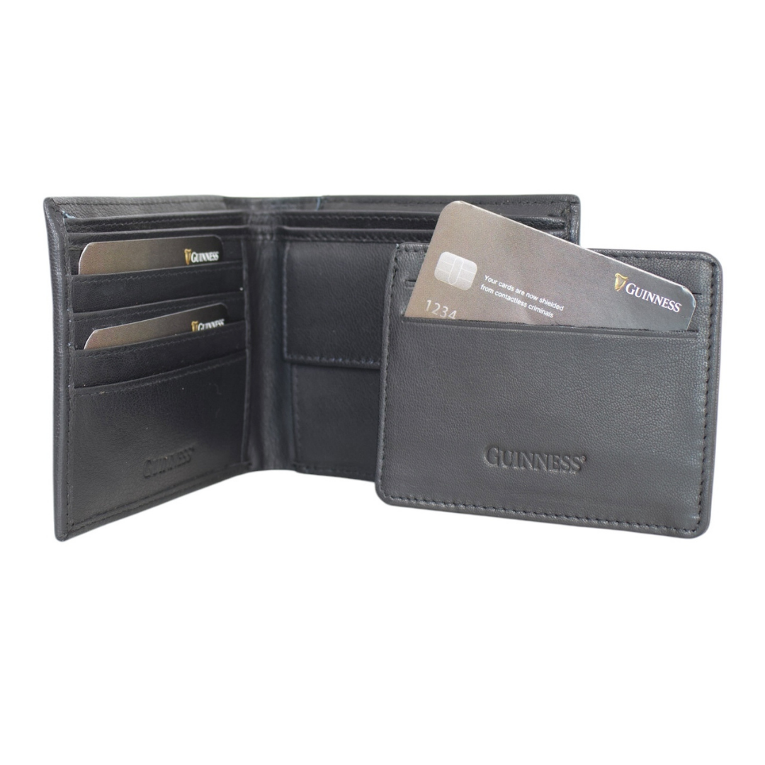 Guinness black leather wallet open to reveal inner card slots and a card in the outer pocket