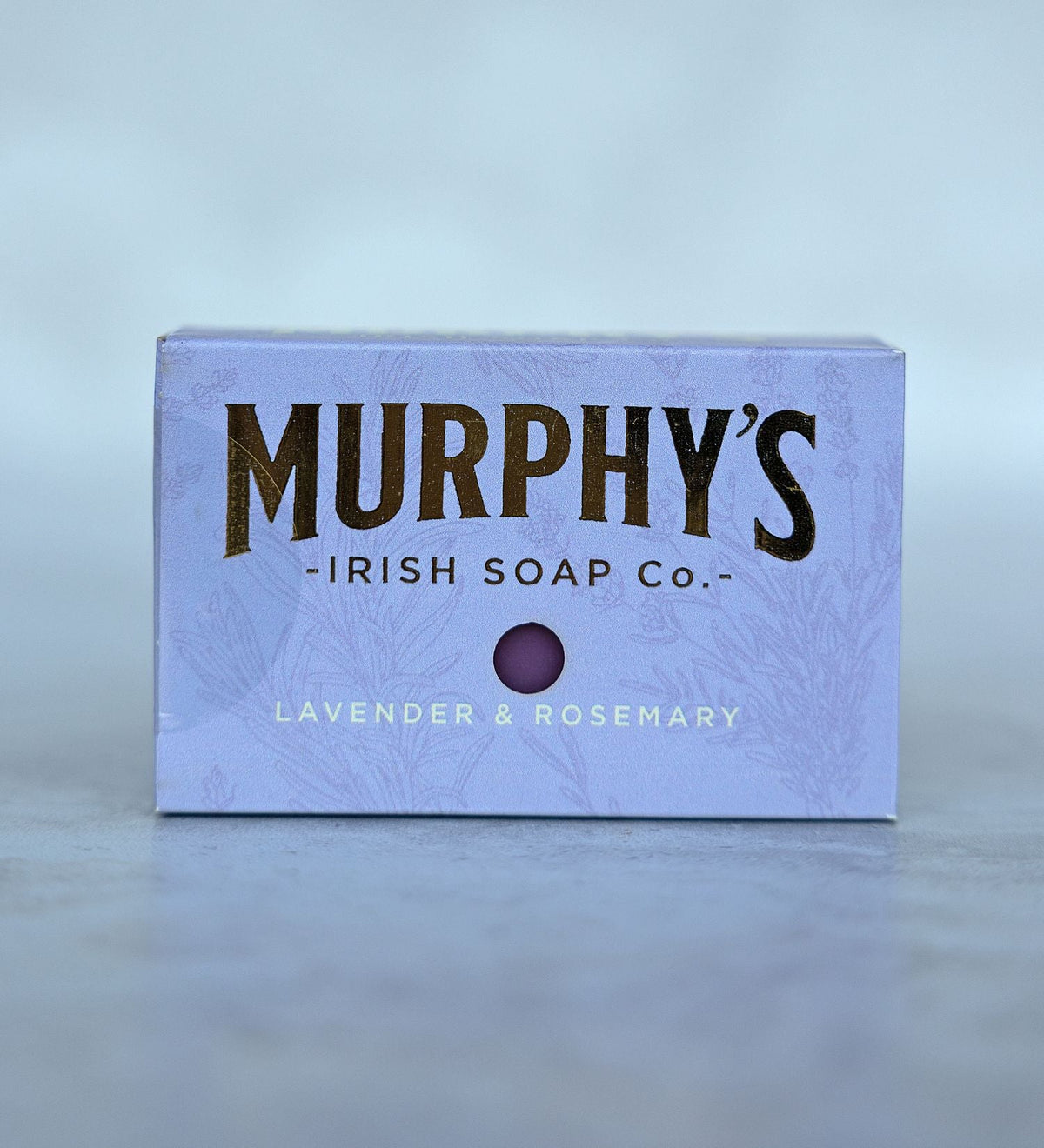 Lavender and rosemary scented soap bar in purple packaging